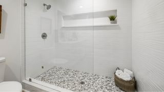 bathroom shower that needs a speaker
