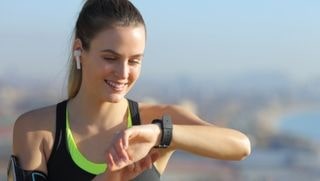 girl wearing ipx8 earbuds